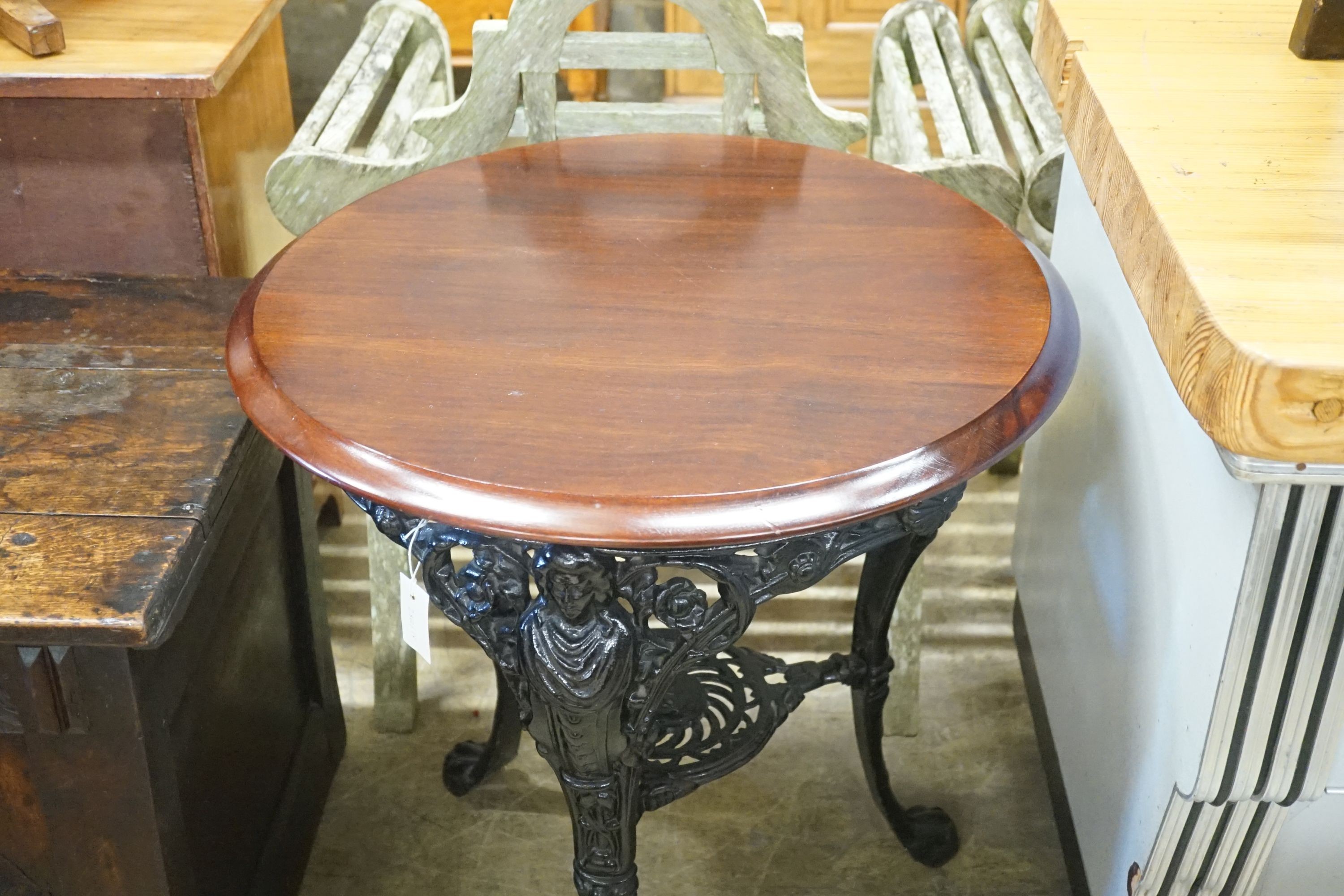 A Victorian painted cast iron pub table, diameter 68cm height 72cm